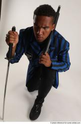 Garson KNEELING POSE WITH SHOTGUN